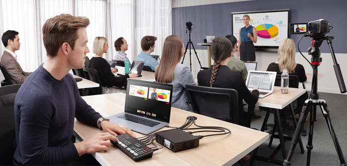 Students learning professional media production